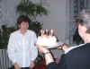 Party 11_7Dec02 predavani dortu oslavenkyni.JPG (44407 bytes)